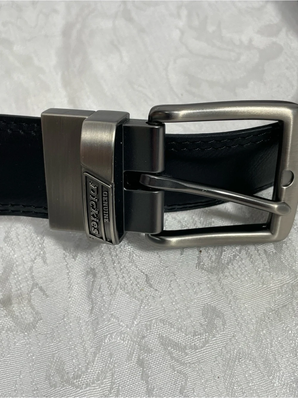 Dickies Black Leather Belt with Silver Tone Metal Buckle.